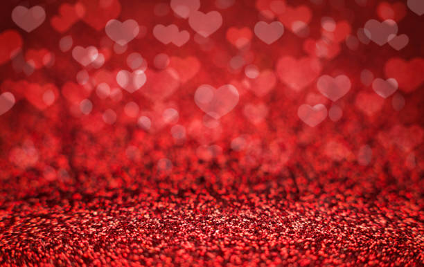 istock Red Valentine Day background with bokeh hearts 1125365153