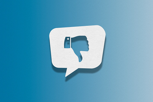 Speech bubble on blue background, Thumbs Down