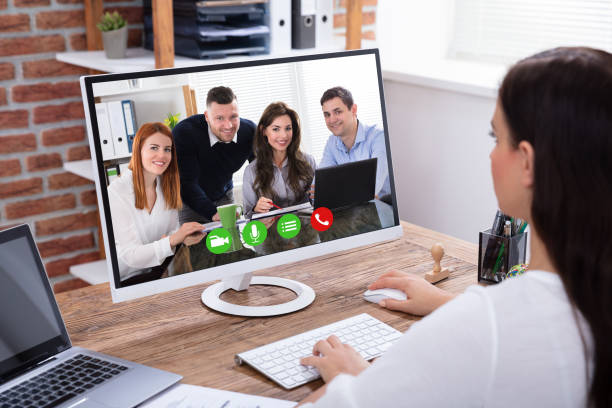 istock Businesswoman Videoconferencing With Her Colleagues On Computer 1125365634