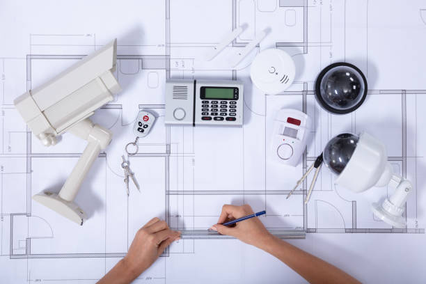 istock Female Architect Drawing Blueprint With Pencil 1125366029