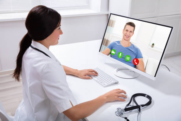 istock Doctor Video Conferencing With Male Patient On Computer 1125366149