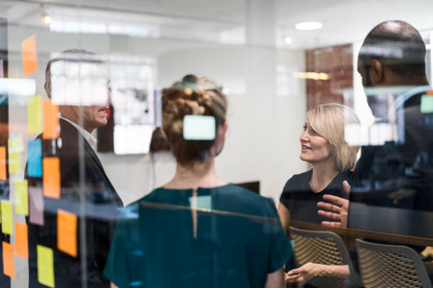 istock Multi-ethnic entrepreneurs planning in board room 1125372207