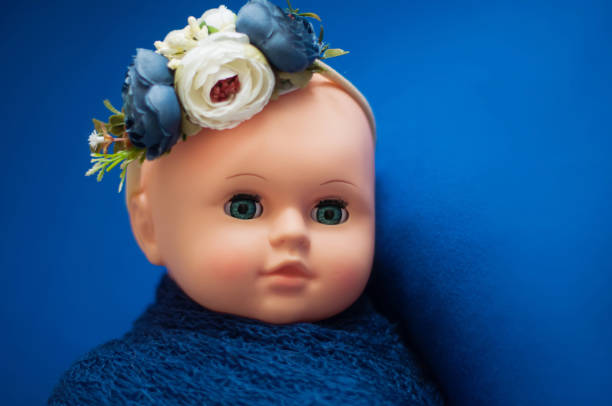 istock Baby doll toy photodraphed in a newborn style. 1125376607