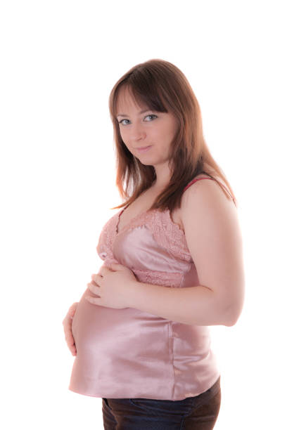istock pregnant woman on white background 1125377061