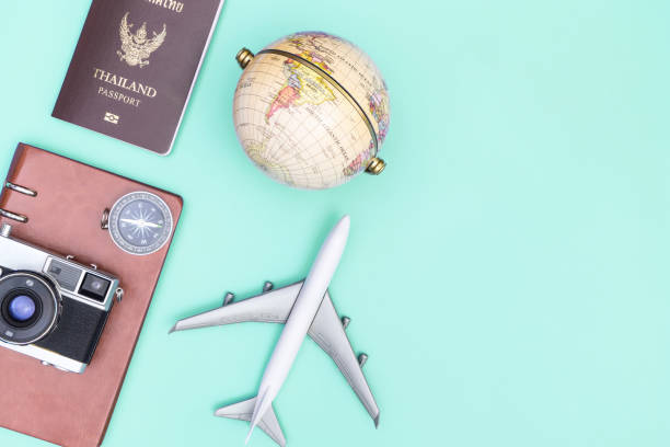 istock travel document and accessories on blue teal copy space flat lay top view 1125378391