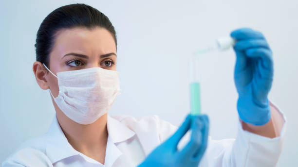 istock Young female biologist at work 1125379499