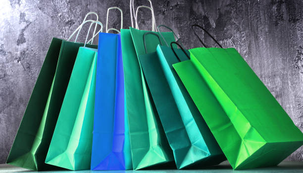 istock Composition with colorful paper shopping bags 1125380556