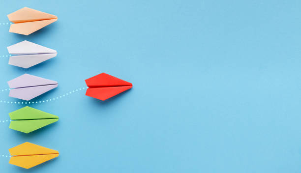 istock Red paper plane leading another ones, leadership concept 1125380994