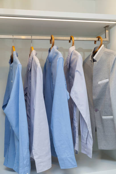 istock Clothes hanging in the closet. 1125381216