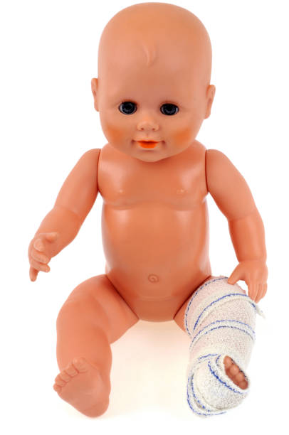 istock Doll with bandaged leg 1125383173