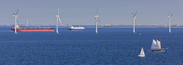 istock Sailing ships, windmills and tankers 1125385265
