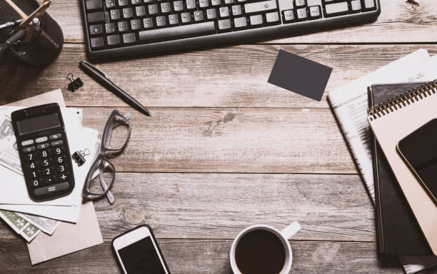 istock Business table on wooden background 1125386215