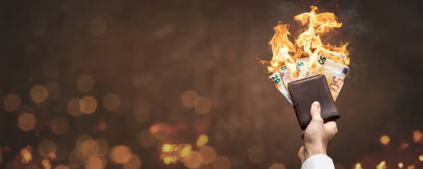 istock Burning Euro bills in a wallet 1125388758