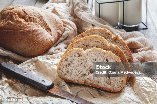 Delicious Homemade Sourdough Rye Bread On A Plate And Milk Homemade Baking Stock Photo - Download Image Now