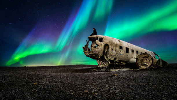 istock Northern lights over plane wreckage in Iceland 1125390199