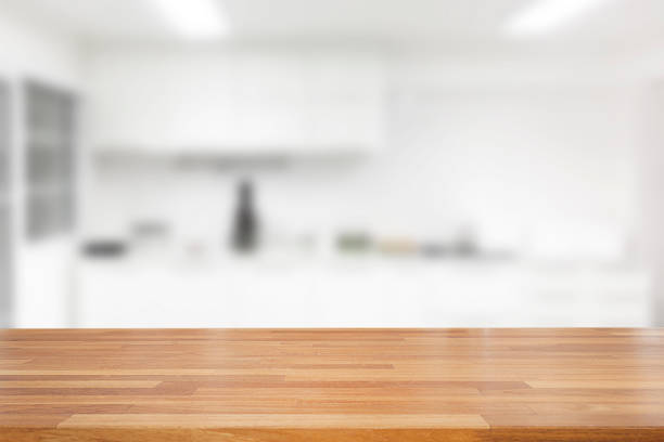 istock Empty wooden and table on abstract white modern kitchen background with shelf 1125390222