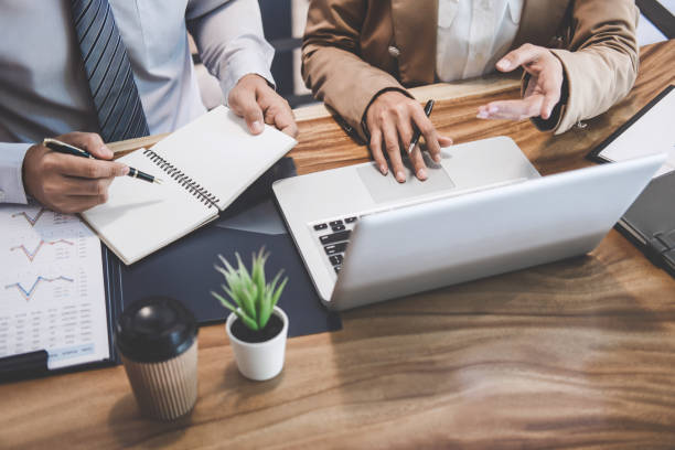 istock Business team colleague working with new startup project plan and discussion information for financial strategy with laptop, results of their successful teamwork 1125391473