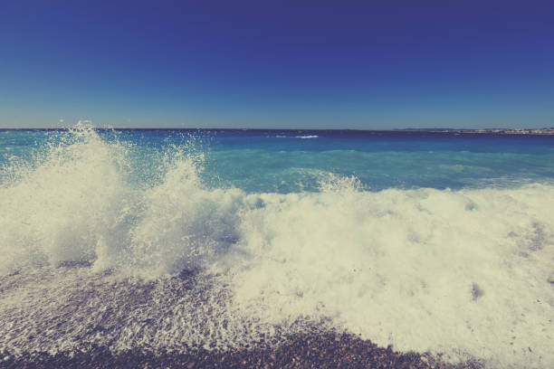Waves rolling on a pebble beach on the Cote d'Azur
