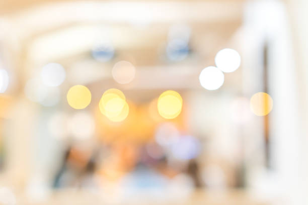 istock abstract blur inside modern architecture loft cozy interior shopping mall or department store with light bokeh fro design concept 1125394116