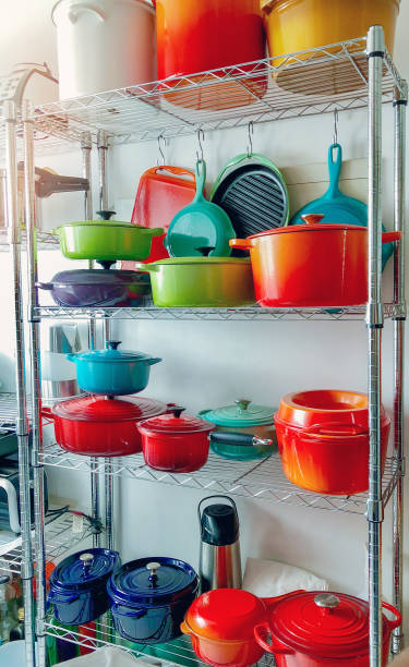 istock Colored cookware on steel shelf. 1125394444