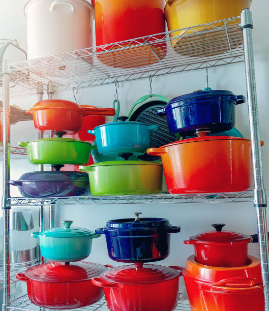 istock Colored cookware on steel shelf. 1125395215