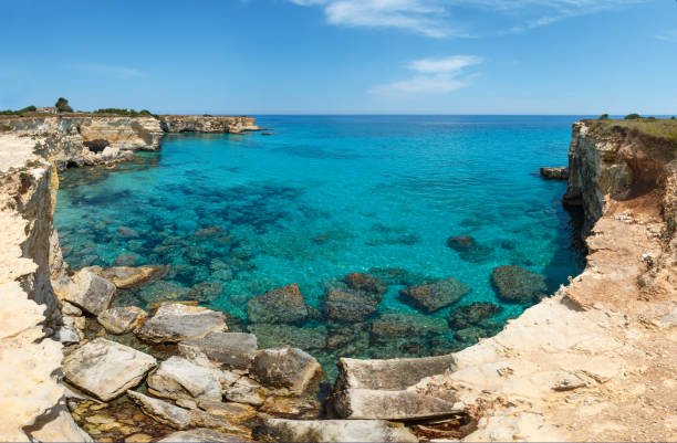 istock Faraglioni at Torre Sant Andrea, Italy 1125399323