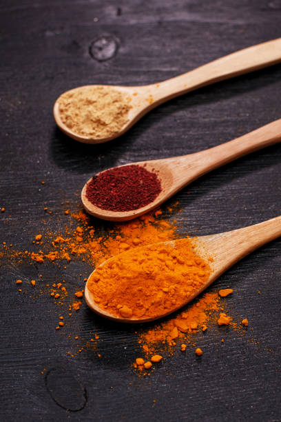 istock spices in spoons on wooden table 1125401918