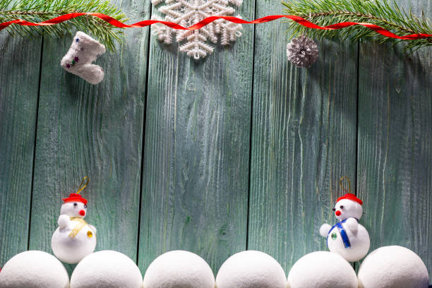 istock Christmas theme with christmas tree, snowman and deers 1125403362