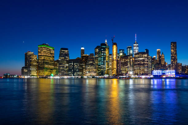 istock Sunset over Manhattan - View from Brooklyn park 1125403841