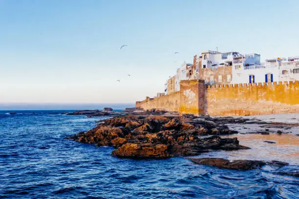 Photo of Essaouira, Morocco. View of the panorama of the city and the medieval old ancient medina of Essaouira. Landscape with the city. Postcard