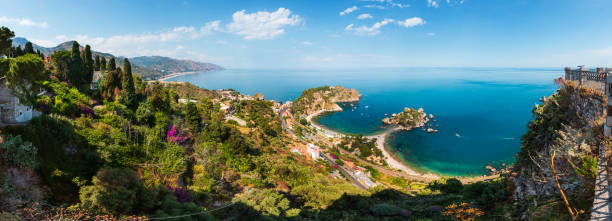 Taormina view from up, Sicily Beautiful Taormina panoramic view from up (Stairs to Taormina), Sicily, Italy. Sicilian seascape with coast, beaches and island Isola Bella. People unrecognizable. isola bella taormina stock pictures, royalty-free photos & images