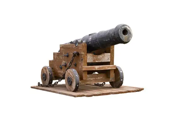 Photo of the old cast-iron cannon on a wooden stand