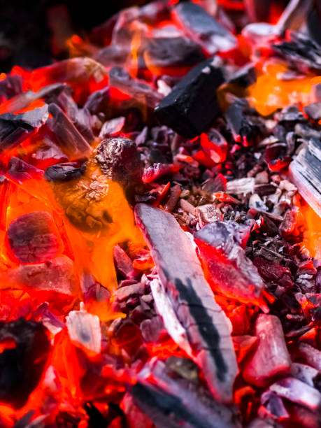 istock A burning fire burns to coals with a bright red-yellow flame for roasting meat. 1125420724