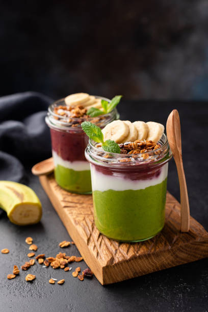 istock Rainbow Avocado spinach and acai breakfast smoothie in jar 1125423763