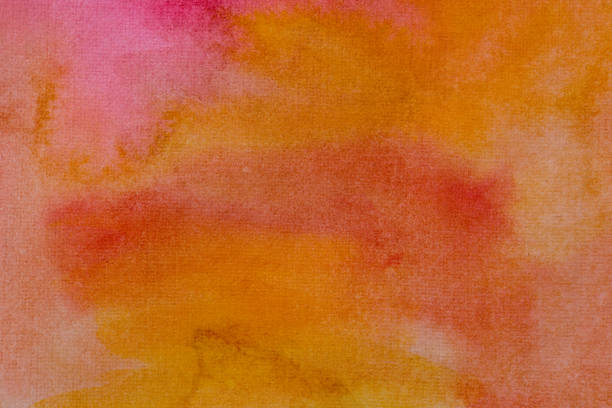 istock watercolor texture on paper red orange spots 1125427410