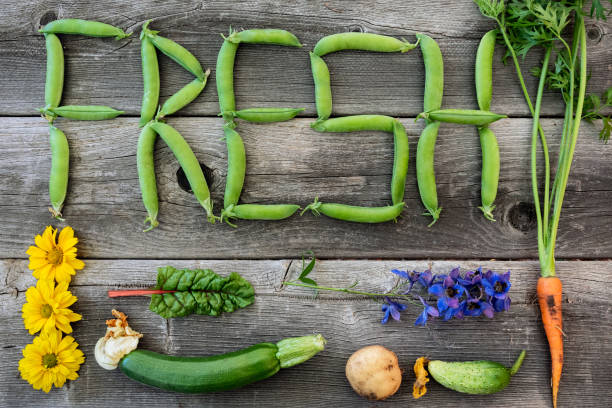 The word "Fresh" written in organic peas from the garden