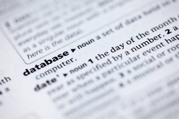 istock Close up to the dictionary definition of word Database 1125434823