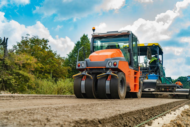 istock Roller, construction equipment, on the road repair site. 1125437086