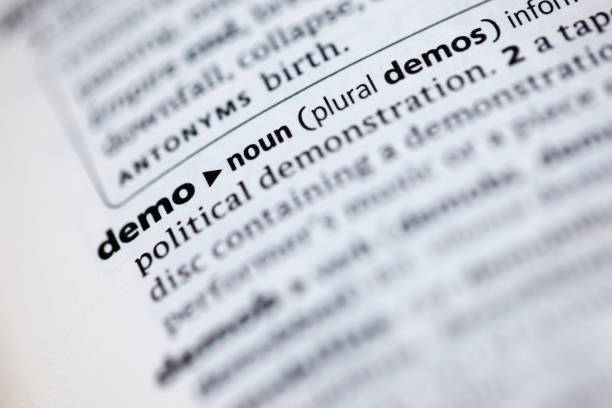 istock Close up to the dictionary definition of word Demo 1125437251