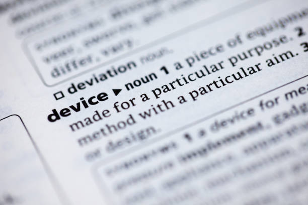 istock Close up to the dictionary definition of word Device 1125439248