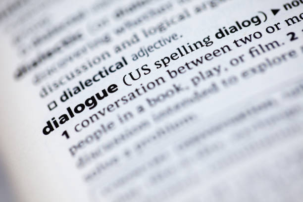 istock Close up to the dictionary definition of word Dialogue 1125439372