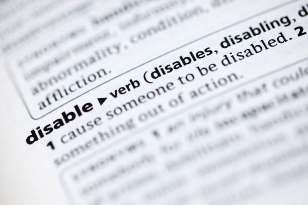 istock Close up to the dictionary definition of word Disable 1125439817