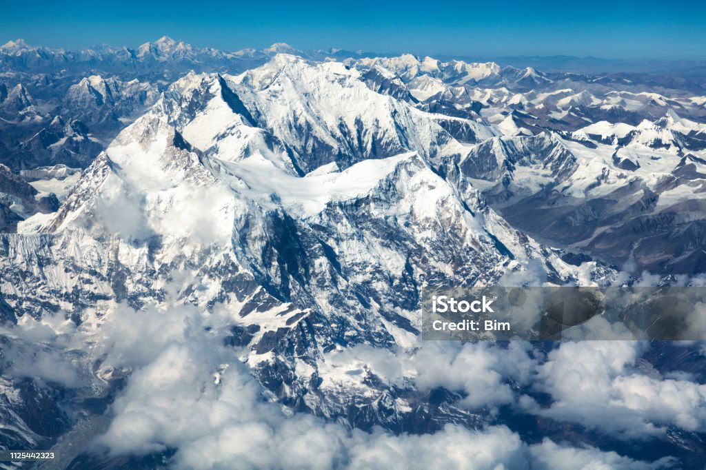 Aerial View of Mount Everest, Himalaya, Nepal Aerial View of Mount Everest 8,848 m (29,029 ft), Himalaya, Nepal, Asia. Mt. Everest Stock Photo