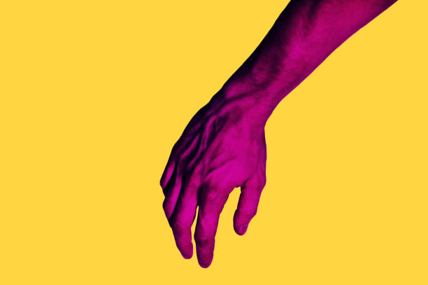 istock Isolated hand photo on yellow background. Pink hand collage style. Bright pop art 1125445501