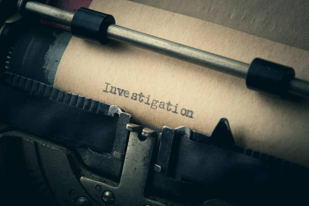 Vintage inscription made by old typewriter, investigation stock photo