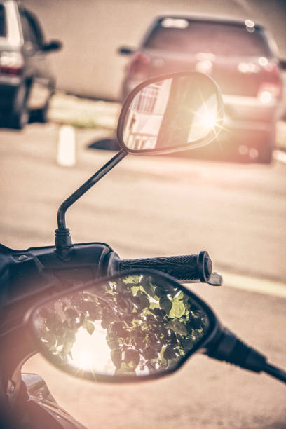 istock Motorcycles parked in the shade of a tree. 1125449126