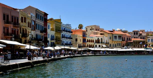 istock Visitors exploring the restaurants and shops of Chania harbour 1125449247