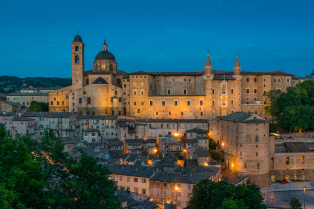 Panorama in Urbino in the evening, city and World Heritage Site in the Marche region of Italy. Panorama in Urbino in the evening, city and World Heritage Site in the Marche region of Italy. marche italy photos stock pictures, royalty-free photos & images