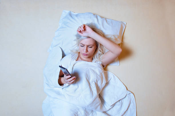 istock Young adult woman having insomnia problem 1125454420
