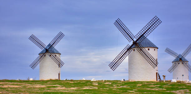istock Windmills of La Mancha-Spain . Sunset on a cloudy day 1125454933